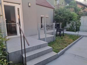 a set of stairs leading up to a house at GAG Apartment in TRAM zone with FREE PARKING in front of the house in Zagreb