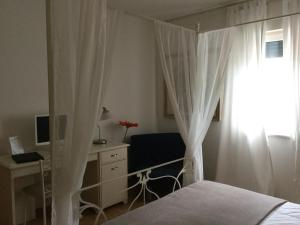 Albergo Belvedere房間的床