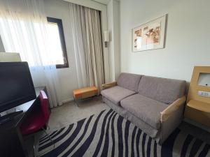 A seating area at a&o Hostel Milano Ca Granda