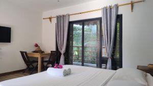 Giường trong phòng chung tại Bush Paradise Kiwengwa +34 ảnh