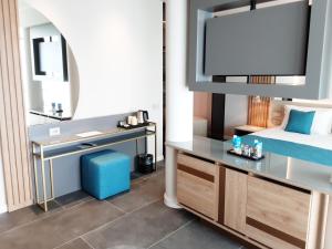 Posteľ alebo postele v izbe v ubytovaní HOTEL ASTOR