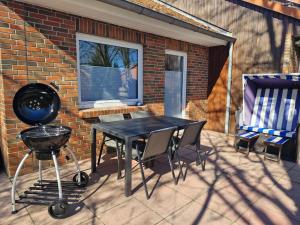 Ein Patio oder anderer Außenbereich in der Unterkunft Urlauberdorf Haus 31d