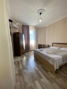 Postel nebo postele na pokoji v ubytování Guest House Deme