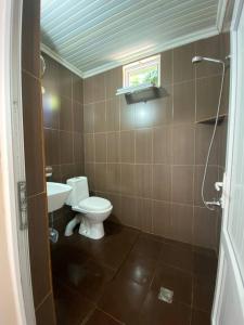 Koupelna v ubytování Guest House Deme