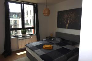Postel nebo postele na pokoji v ubytování Beograd na vodi Lux apartman BW-Octopus