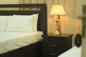 Ένα ή περισσότερα κρεβάτια σε δωμάτιο στο Starlit Hotel - Gilgit