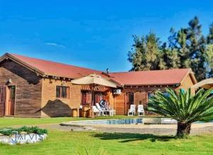 Zahrada ubytování Essanya Chalet with a private pool - Country side of nabeul