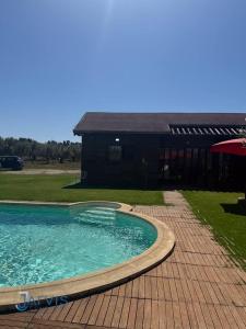 Bazén v ubytování Essanya Chalet with a private pool - Country side of nabeul nebo v jeho okolí