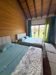 Postel nebo postele na pokoji v ubytování Essanya Chalet with a private pool - Country side of nabeul