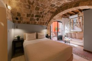 Cama ou camas em um quarto em Zacosta Villa Hotel