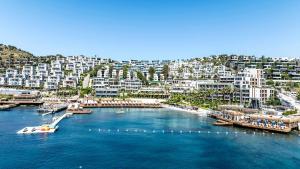 an aerial view of a city with buildings and a harbor at Mirada Exclusive Bodrum in Bodrum City