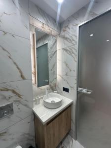 a bathroom with a sink and a mirror at VIP Anvers Villa 50 in Elenite +30 photos
