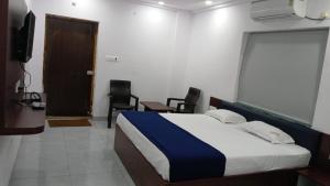 Katil atau katil-katil dalam bilik di Relax Mansion