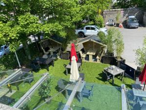 an overhead view of a garden with tables and umbrellas at Castle Arch Hotel in Trim