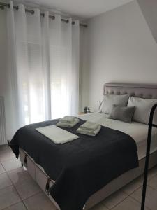 Voodi või voodid majutusasutuse Sunny Luxury House Iraklitsa toas