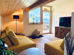 TV a/nebo společenská místnost v ubytování Fössing Hof.Apartment