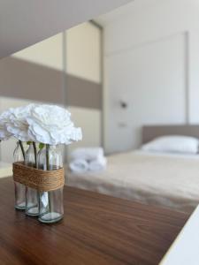 Llit o llits en una habitació de Luxury Central Apartment Volkan
