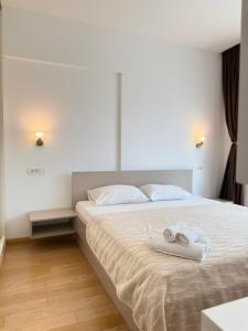 Llit o llits en una habitació de Luxury Central Apartment Volkan