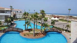 Bazén v ubytování Appartement au Bord de la Mer nebo v jeho okolí