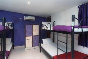Letto o letti in una camera di Joey's Hostel Agra - 200m from Taj Mahal
