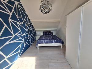 Postel nebo postele na pokoji v ubytování Cozy Nest
