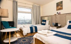 Khovuun hotel客房内的一张或多张床位