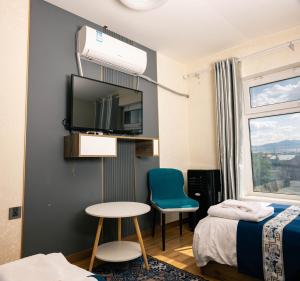 Khovuun hotel客房内的一张或多张床位