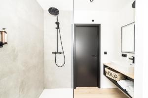 Salle de bains dans l'établissement Hôtel de la Poste