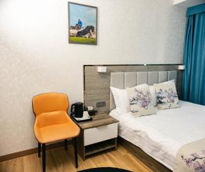Khovuun hotel客房内的一张或多张床位