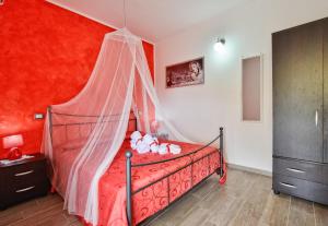 Postel nebo postele na pokoji v ubytování Casa vacanze Il Salice
