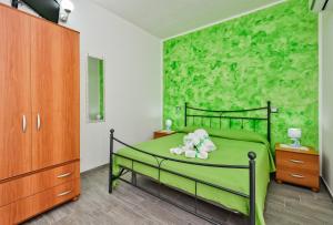 Postel nebo postele na pokoji v ubytování Casa vacanze Il Salice