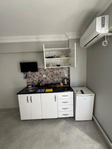 Kuchyň nebo kuchyňský kout v ubytování Kaman Home Apart