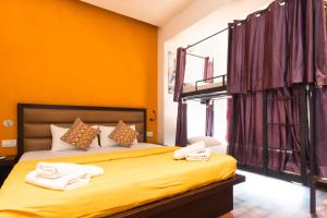Letto o letti in una camera di Joey's Hostel Agra - 200m from Taj Mahal
