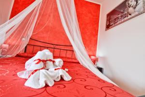 Postel nebo postele na pokoji v ubytování Casa vacanze Il Salice