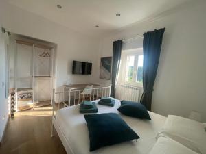 Krevet ili kreveti u jedinici u okviru objekta Le Suite del Borgo - Emerald Suite