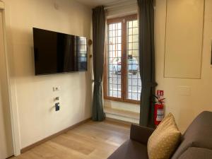 TV i/ili multimedijalni sistem u objektu Le Suite del Borgo - Emerald Suite