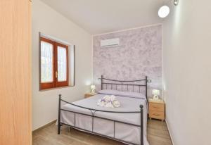 Postel nebo postele na pokoji v ubytování Casa vacanze Il Salice