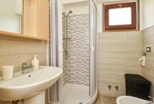 Koupelna v ubytování Casa vacanze Il Salice + 29 fotografií