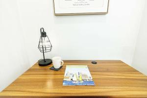 Imagine din galeria proprietății Jennifer's Spa-Like Historic Broadway Getaway în Providence