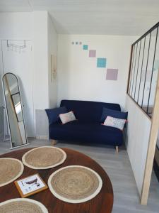 Posezení v ubytování Studio Sulniac Golfe du morbihan avec piscine au sein du domaine