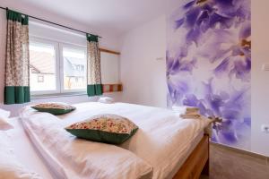 Postel nebo postele na pokoji v ubytování Apartments Viktor