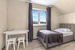 Postel nebo postele na pokoji v ubytování VASOK Hotel NEW 2025