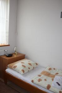 Postel nebo postele na pokoji v ubytování Penzión Koras