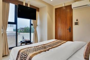 Postel nebo postele na pokoji v ubytování Hotel Sayba International