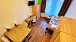 TV a/nebo společenská místnost v ubytování BeBudgetRooms