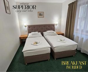 Posteľ alebo postele v izbe v ubytovaní Hotel Claris