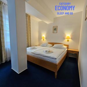 Posteľ alebo postele v izbe v ubytovaní Hotel Claris