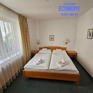 Posteľ alebo postele v izbe v ubytovaní Hotel Claris