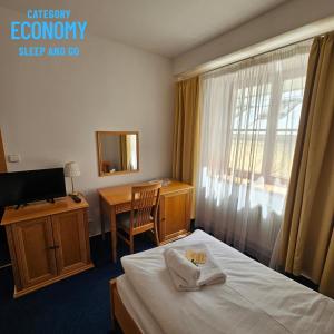 Posteľ alebo postele v izbe v ubytovaní Hotel Claris