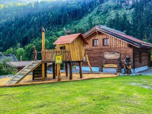 Area giochi per bambini di Feriendorf X-Alp Lodges Ötztal
